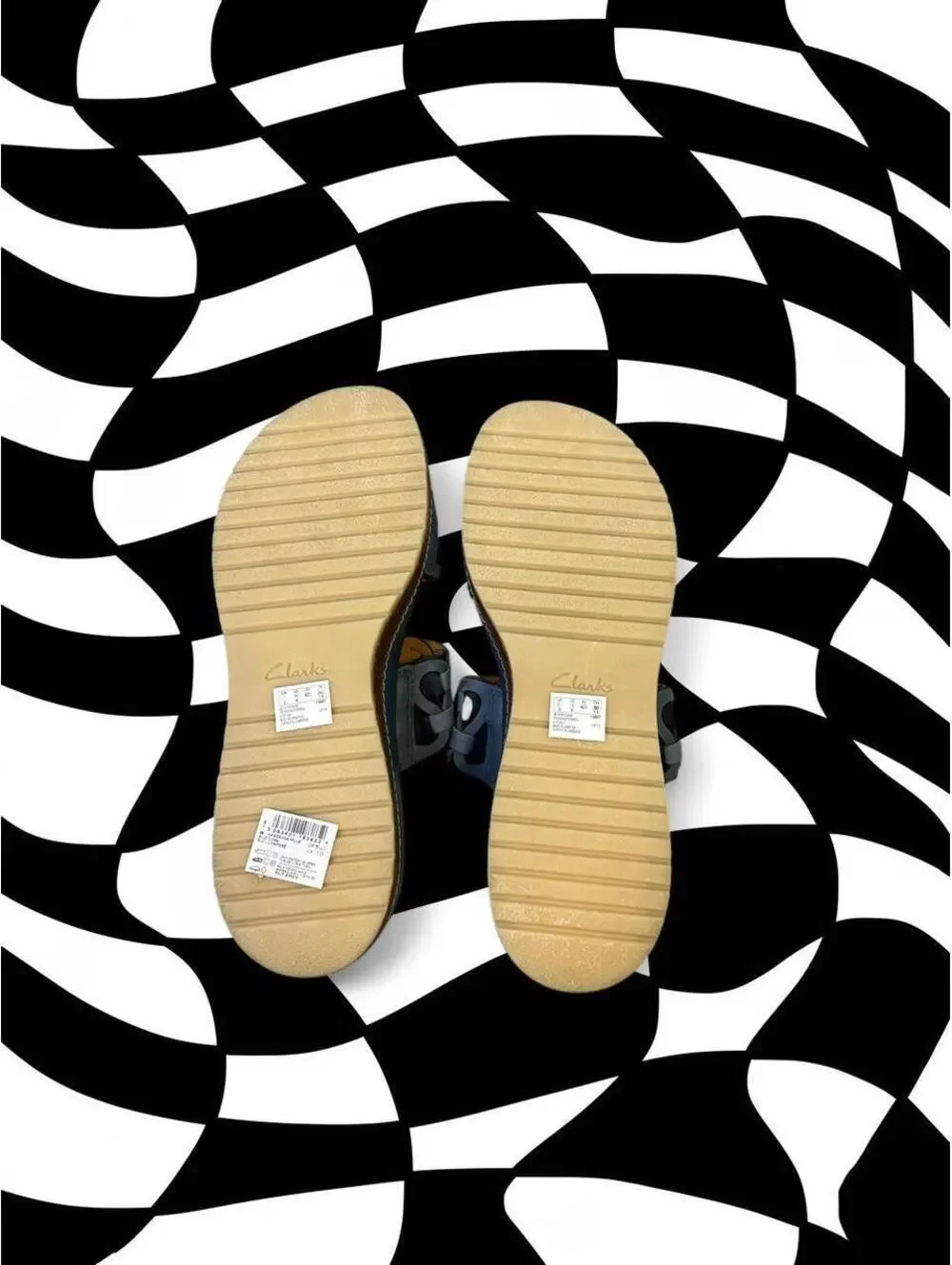 Clark’s blue leather sandals with woven strap detail